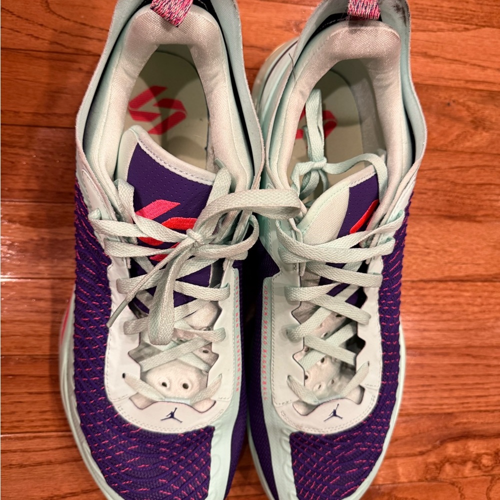 Luka Jordan’s Purple and Mint Athletic Sneakers